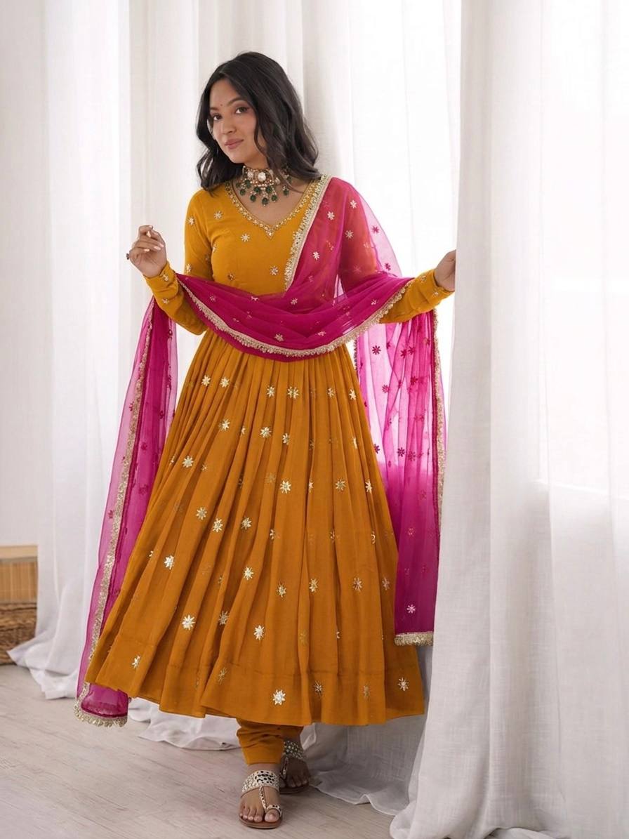 Mustard Gold Anarkali Suit with Delicate Butti Work & Pink Dupatta