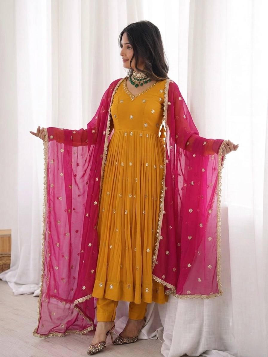 Mustard Gold Anarkali Suit with Delicate Butti Work & Pink Dupatta