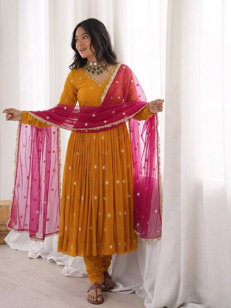 Mustard Gold Anarkali Suit with Delicate Butti Work & Pink Dupatta