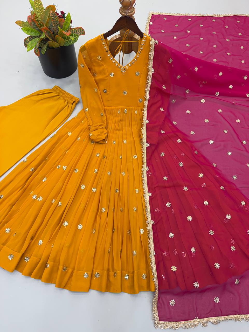 Mustard Gold Anarkali Suit with Delicate Butti Work & Pink Dupatta