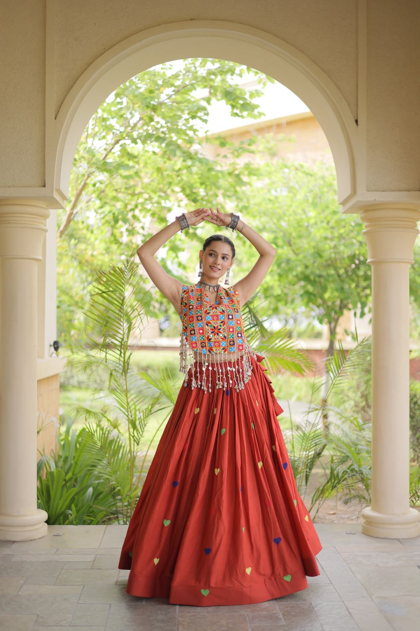 Vibrant Mirror Work Choli & Red Multicolor Heart Embellished Lehenga