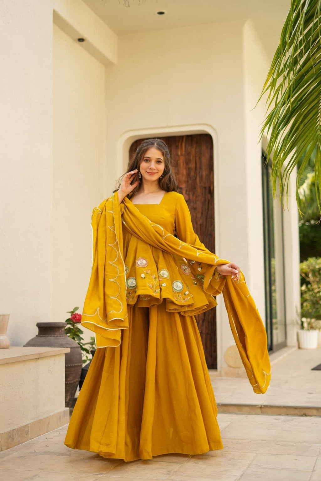 Mustard Yellow Embroidered Peplum Anarkali Sharara Set with Floral Motif Detailing & Scalloped Embellished Dupatta