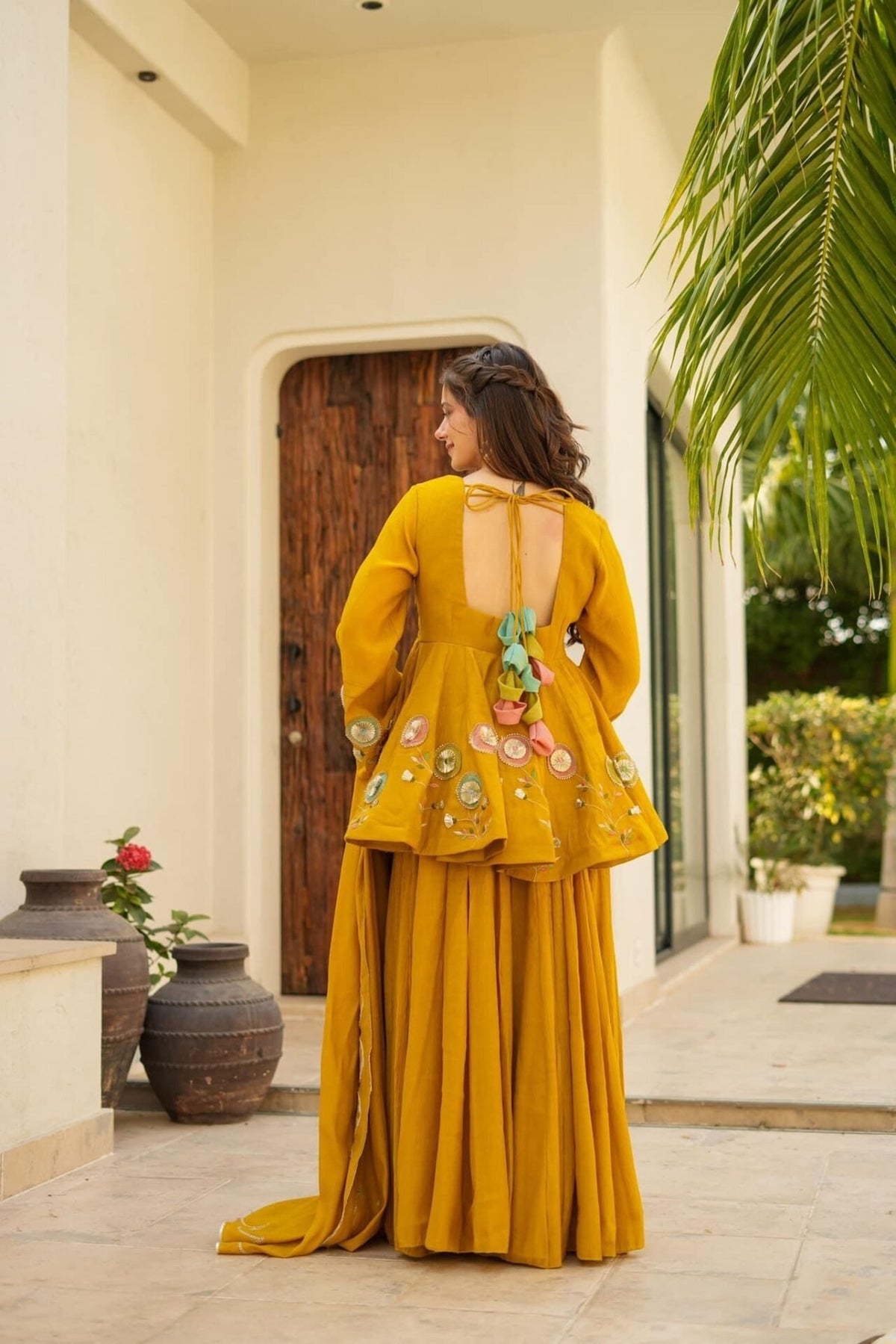 Mustard Yellow Embroidered Peplum Anarkali Sharara Set with Floral Motif Detailing & Scalloped Embellished Dupatta
