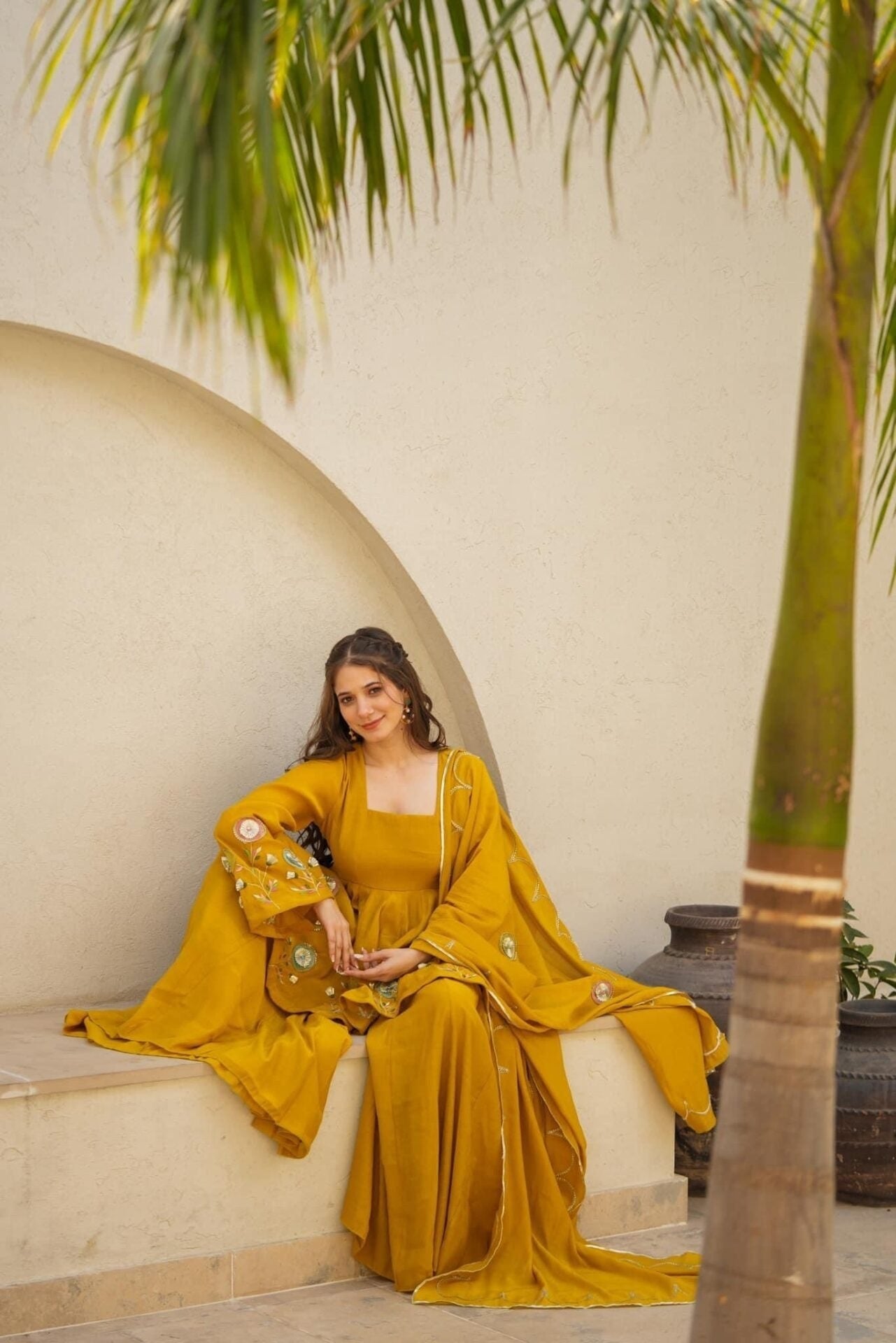 Mustard Yellow Embroidered Peplum Anarkali Sharara Set with Floral Motif Detailing & Scalloped Embellished Dupatta