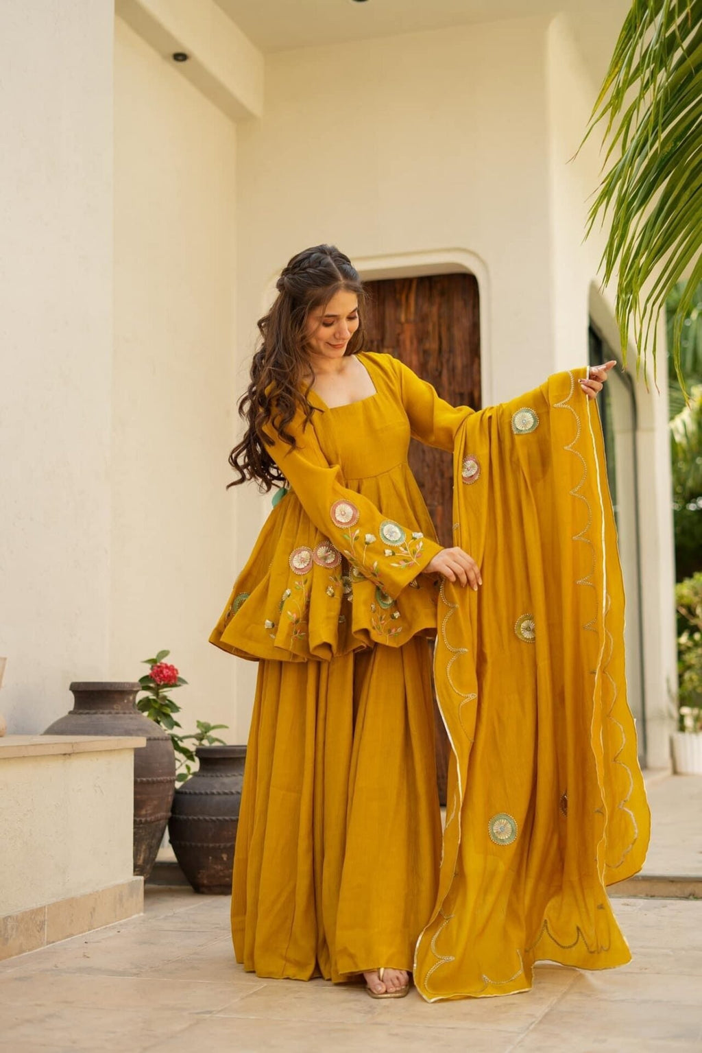 Mustard Yellow Embroidered Peplum Anarkali Sharara Set with Floral Motif Detailing & Scalloped Embellished Dupatta