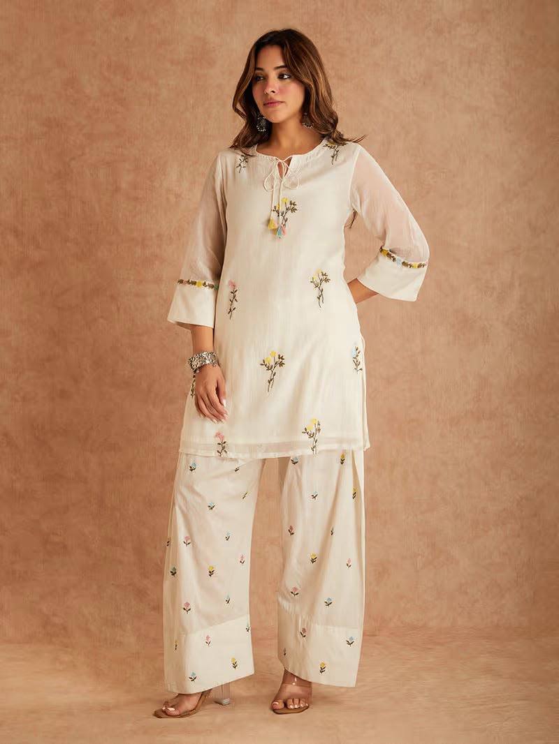 Elegant Ivory Embroidered Kurta Pant Set with Multicolor Floral Bootis, Tie-Up Neckline & Organza Dupatta with Lace Border