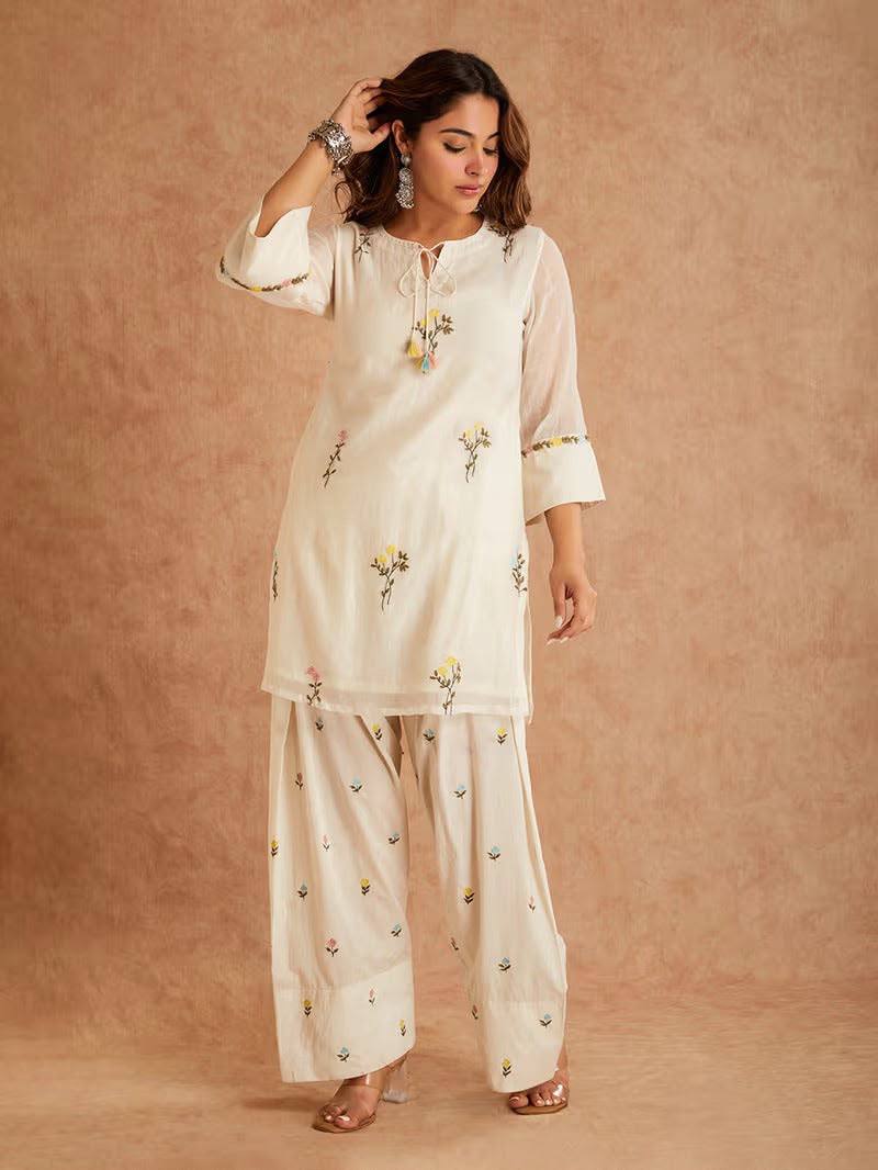 Elegant Ivory Embroidered Kurta Pant Set with Multicolor Floral Bootis, Tie-Up Neckline & Organza Dupatta with Lace Border