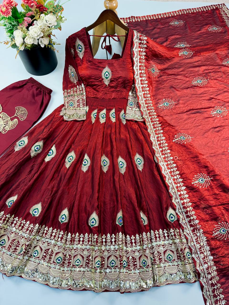 Royal Maroon Silk Anarkali Gown with Intricate Peacock Motif Embroidery, Heavy Designer Border & Embellished Dupatta