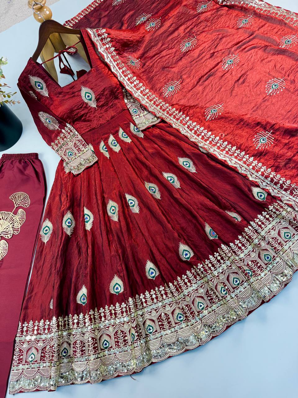 Royal Maroon Silk Anarkali Gown with Intricate Peacock Motif Embroidery, Heavy Designer Border & Embellished Dupatta