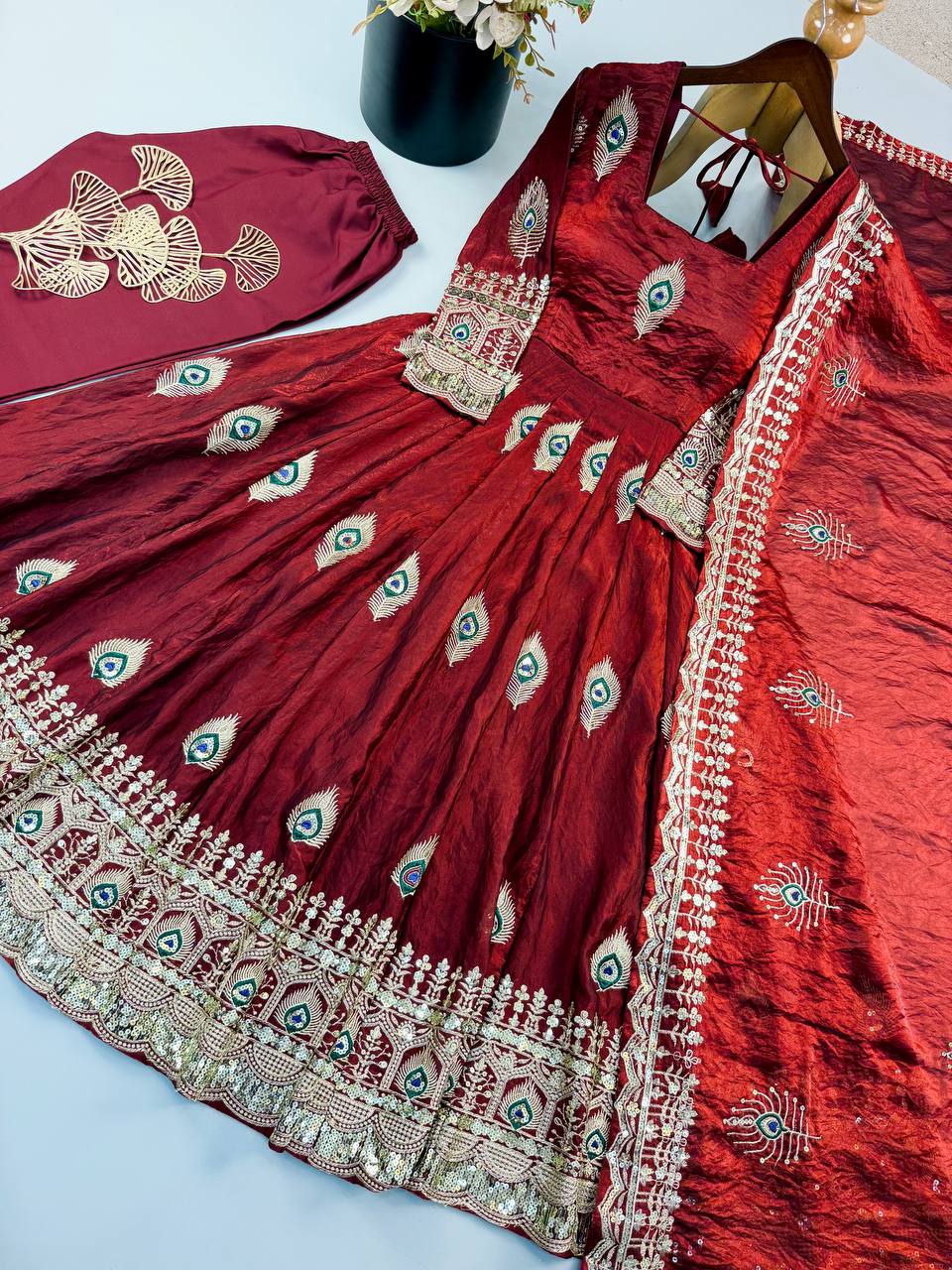 Royal Maroon Silk Anarkali Gown with Intricate Peacock Motif Embroidery, Heavy Designer Border & Embellished Dupatta
