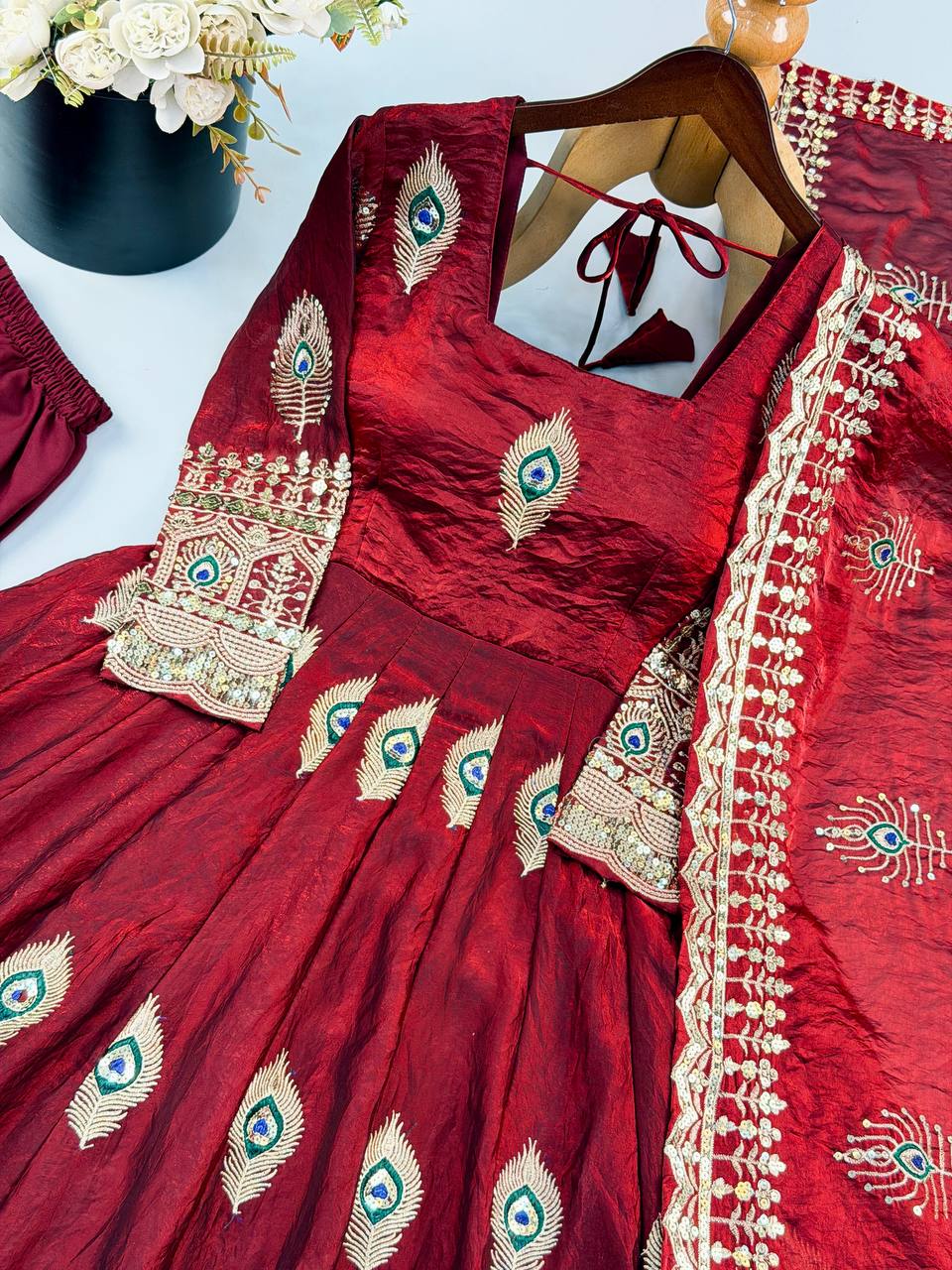 Royal Maroon Silk Anarkali Gown with Intricate Peacock Motif Embroidery, Heavy Designer Border & Embellished Dupatta
