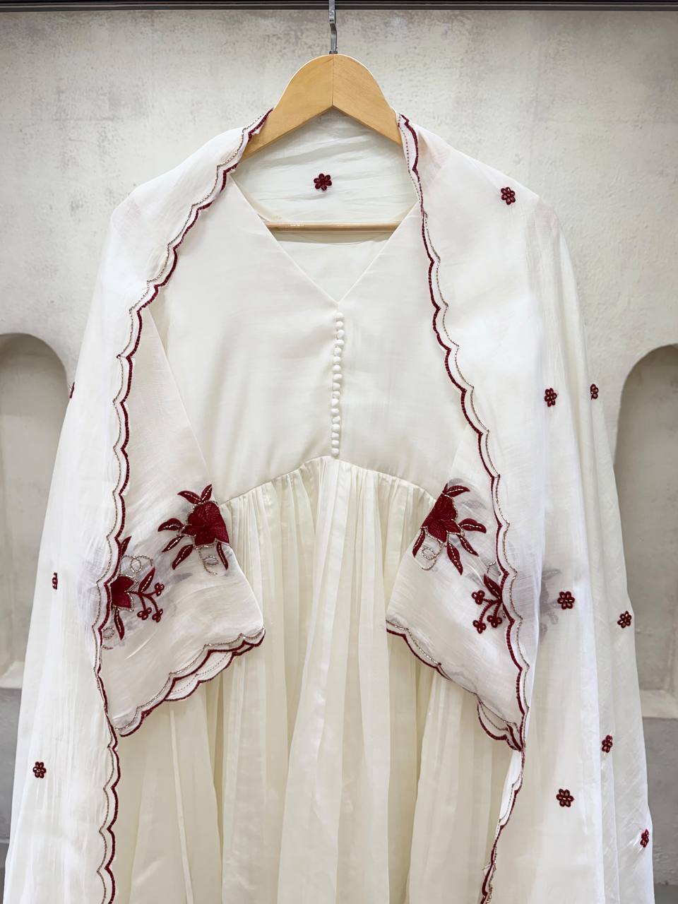 Classic Ivory White Anarkali Suit with Maroon Floral Embroidered Hemline, Pleated Flare, Scalloped Edges & Designer Dupatta