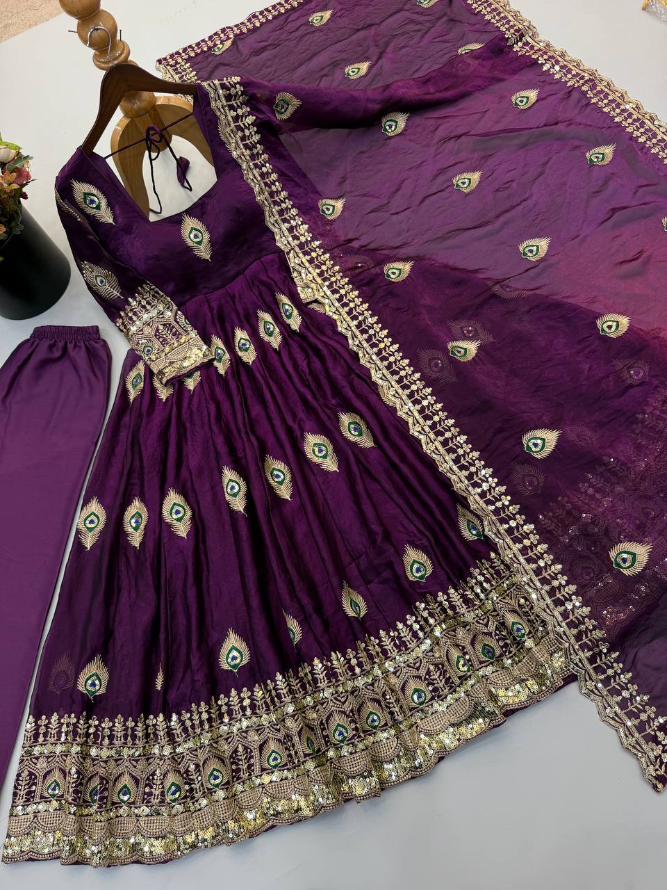 Royal Purple Silk Anarkali Gown with Intricate Peacock Motif Embroidery, Heavy Traditional Lace Border, Embellished Full Sleeves & Matching Designer Dupatta
