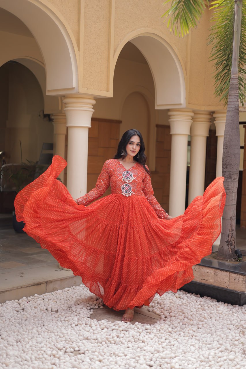 Jhanvi Orange Faux Georgette Laheriya Kutchi Patchwork Gown