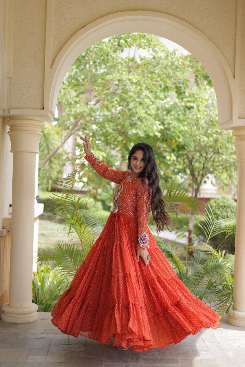 Jhanvi Orange Faux Georgette Laheriya Kutchi Patchwork Gown
