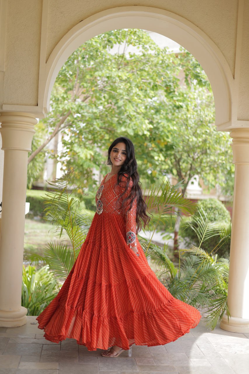 Jhanvi Orange Faux Georgette Laheriya Kutchi Patchwork Gown