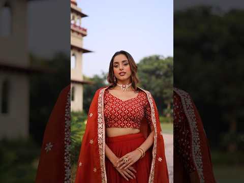 Omira Orange Color Vichitra Silk Sequins Thread Embroidered Lehenga Choli