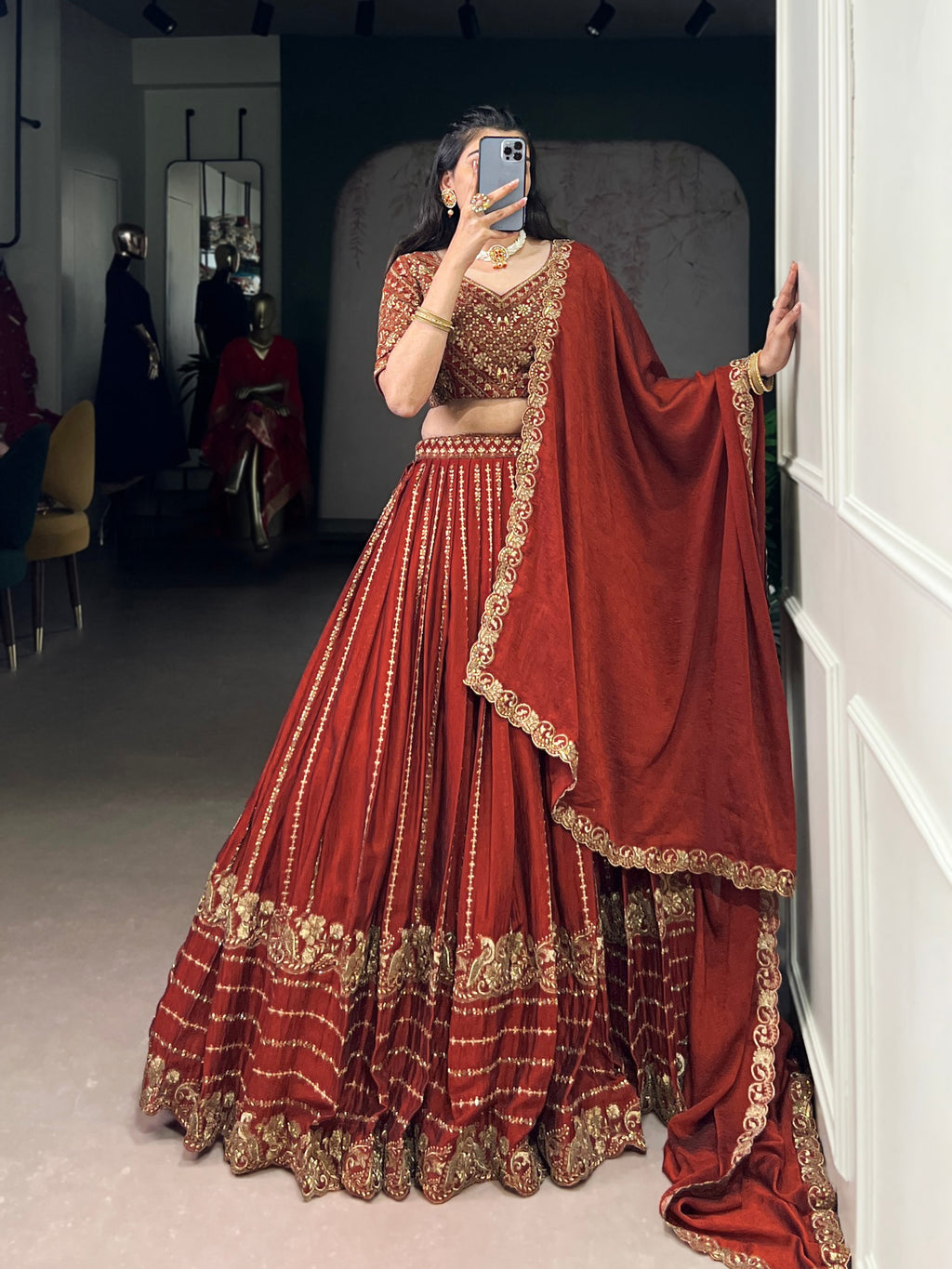 Rust orange silk lehenga choli with sequins thread embroidery