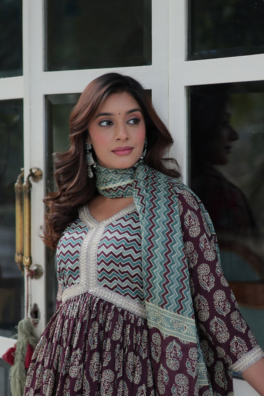 Brown printed pure cotton kurti set for women, lightweight kurti with pant and dupatta, daily wear cotton kurti set, breathable cotton ethnic wear for summer, stylish printed kurta set for casual and office wear, Indian cotton kurti pant set online, elegant brown ethnic suit for women, pure cotton kurti set with traditional print.