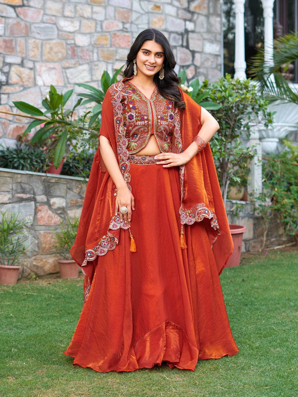 Orange festive wear Fendy silk lehenga choli with embroidery