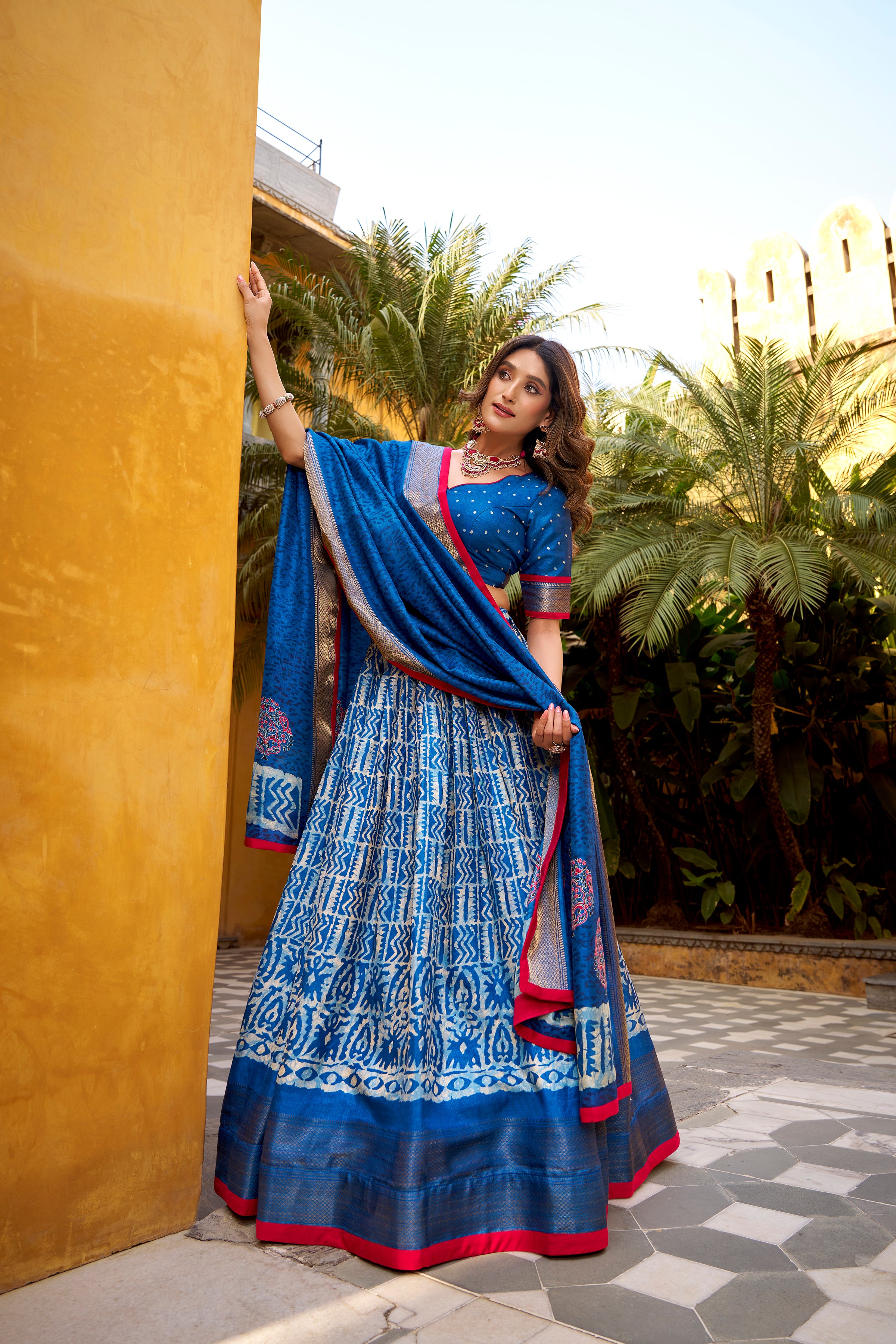 Girija Blue Color Dola Silk Batik Print With Zari
Weaving Work Lehenga Choli