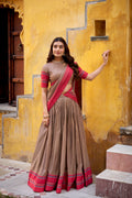 Swastika light brown pure Chanderi thread work half saree lehenga