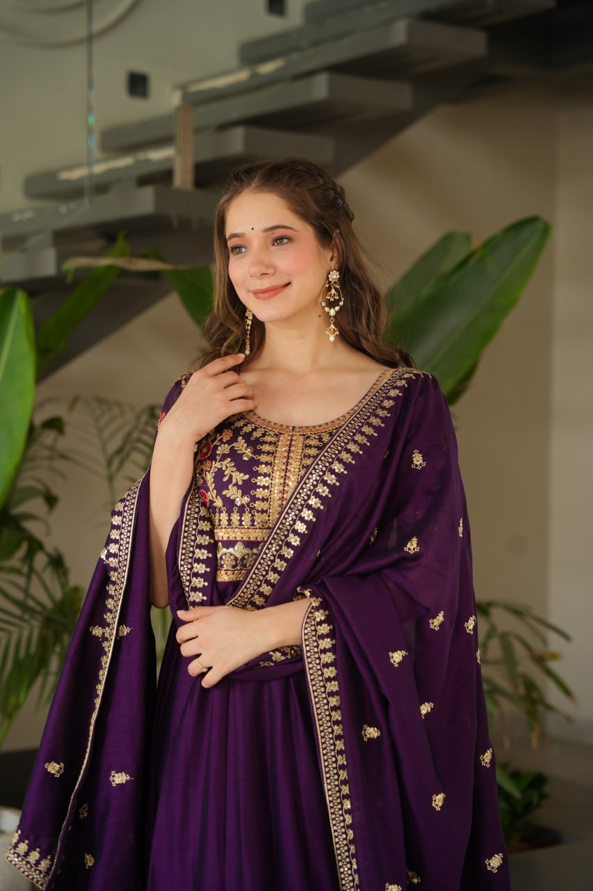 Aadishri Purple Vichitra Silk Gown with multi-sequins and zari embroidery – perfect Indian ethnic wear for weddings, party wear dresses for women, designer gown for women, traditional Indian dress, Indian clothing for women, ethnic wear for girls, gown for wedding function, Indian dress online shopping, full sleeve gown for women, festive wear for ladies.
