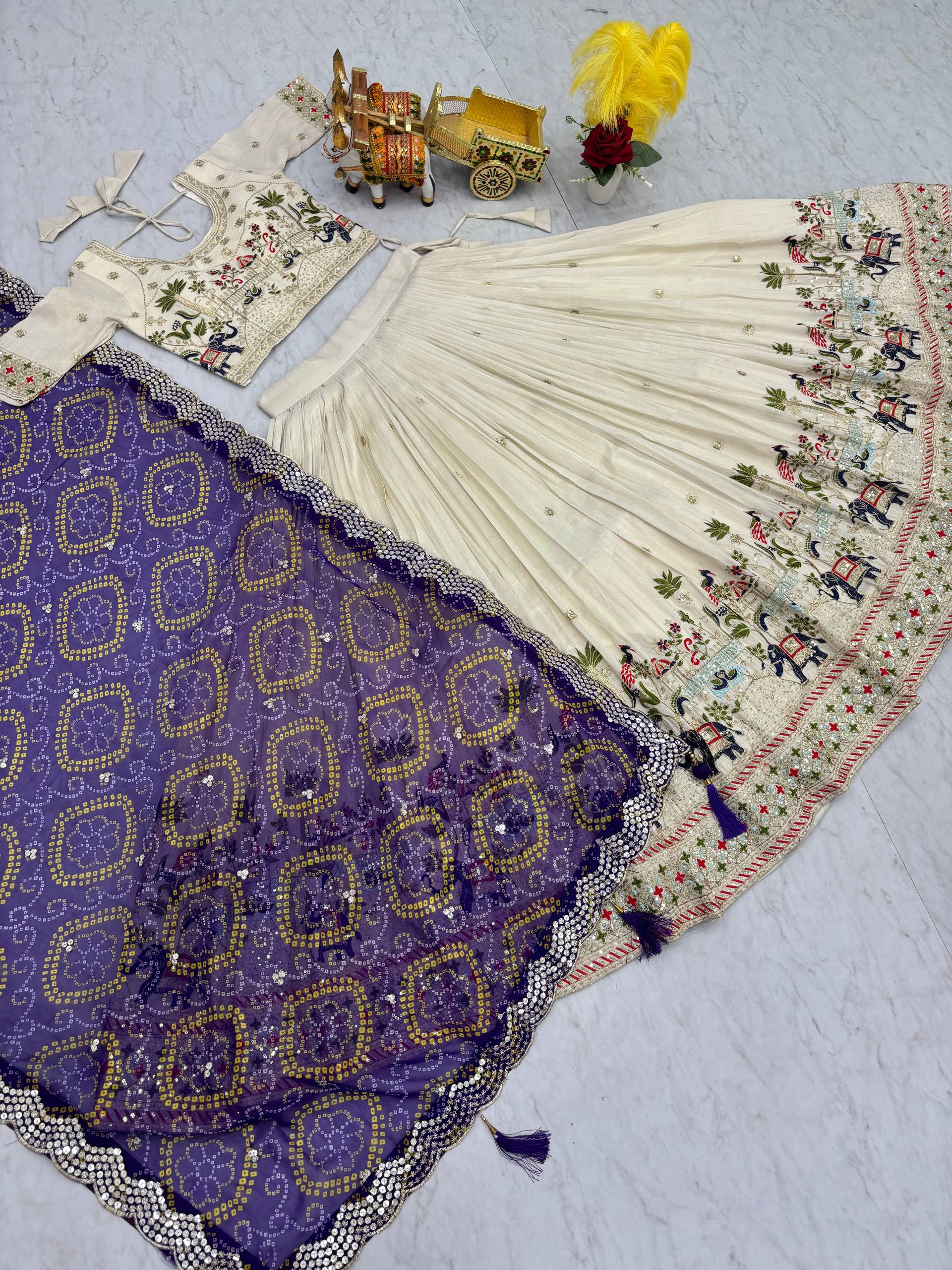 Off-white silk sequins thread embroidery lehenga choli with purple Bandhej dupatta