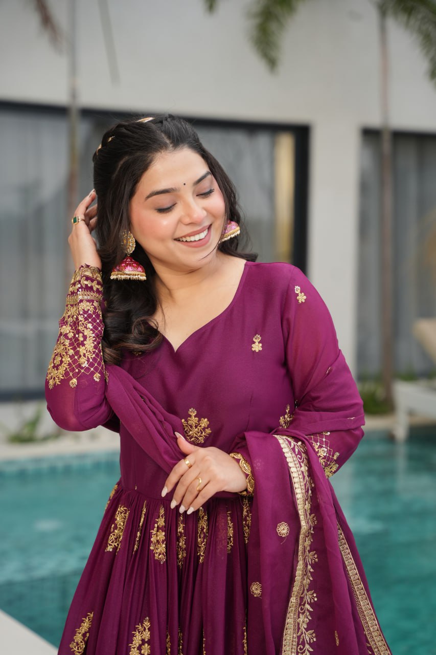 Rudrika Purple Embroidered Gown in soft Star Georgette with intricate zari and sequin work, full-length 56-inch flare gown with matching embroidered dupatta, elegant pan neck design, perfect for weddings and festive occasions