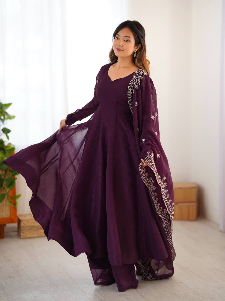 Tiya purple Fandy Silk Anarkali suit with 4.5-meter flair, full sleeves & embroidered dupatta – stitched & ready for weddings, parties & festive wear.