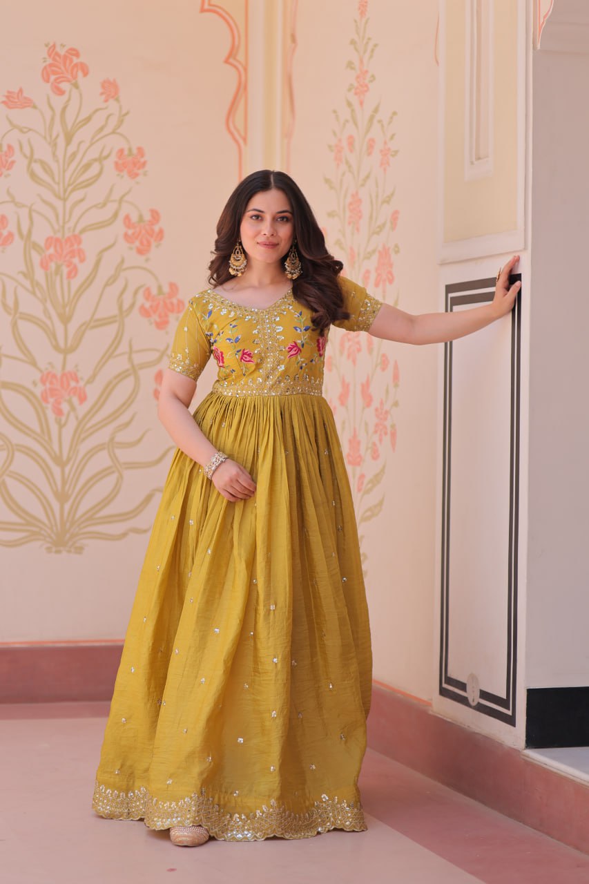Mustard Yellow Gold Crush gown with zari, sequins, and multi-thread embroidery, featuring V-neck and short sleeves – perfect for weddings and festive occasions