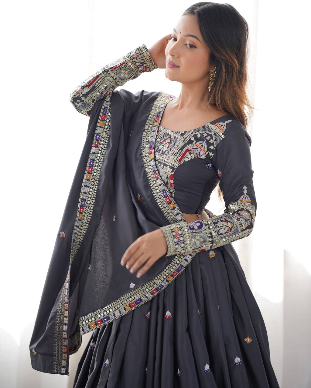 Kavyani Natural Crepe Silk Black Lehenga Choli Set – semi-stitched lehenga with 3-meter flair, cancan and canvas patta, intricately embroidered with coding dori, thread, and sequins; paired with unstitched matching choli and embroidered dupatta with lace border, premium festive and wedding ethnic wear for women by Trinaari.