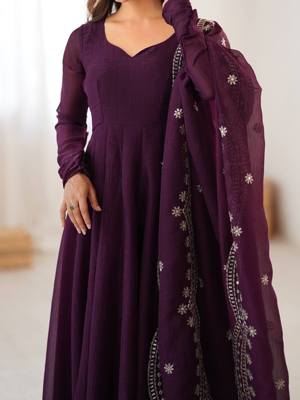 Tiya purple Fandy Silk Anarkali suit with 4.5-meter flair, full sleeves & embroidered dupatta – stitched & ready for weddings, parties & festive wear.