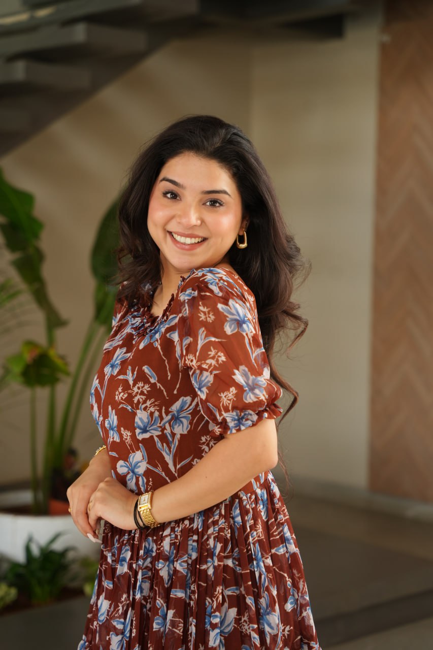 Vikarni Brown Printed Anarkali Gown in faux georgette with 12-meter flair & cotton lining – perfect for haldi, mehndi, festive & Indo-western occasions.