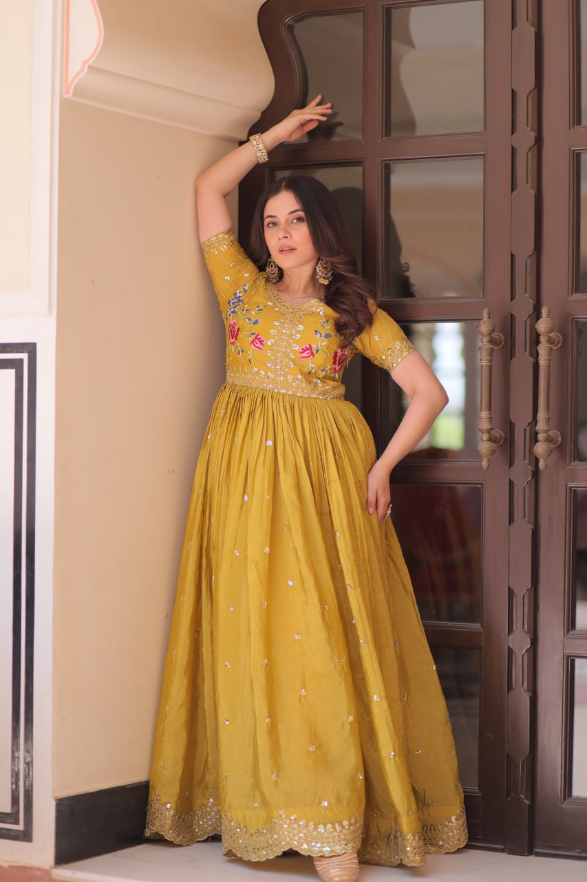 Mustard Yellow Gold Crush gown with zari, sequins, and multi-thread embroidery, featuring V-neck and short sleeves – perfect for weddings and festive occasions
