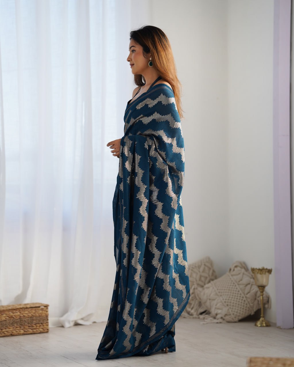 Elegant Aira Blue Georgette saree featuring heavy sequin embroidery and Seroski diamond work, paired with an unstitched satin Banglori blouse – perfect as a wedding saree, party wear saree, festive wear outfit, designer ethnic saree, and a must-have for lovers of premium georgette sarees.