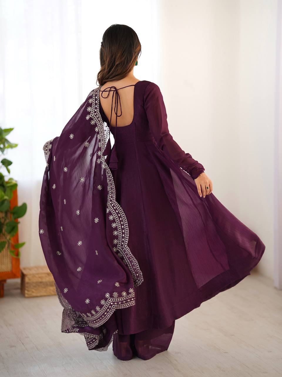 Tiya purple Fandy Silk Anarkali suit with 4.5-meter flair, full sleeves & embroidered dupatta – stitched & ready for weddings, parties & festive wear.