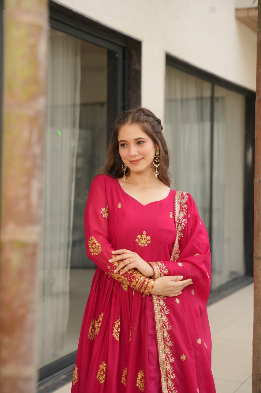 Rudrika Pink Embroidered Gown in soft Star Georgette with intricate zari and sequin work, full-length 56-inch flare gown with matching embroidered dupatta, elegant pan neck design, perfect for weddings and festive occasions