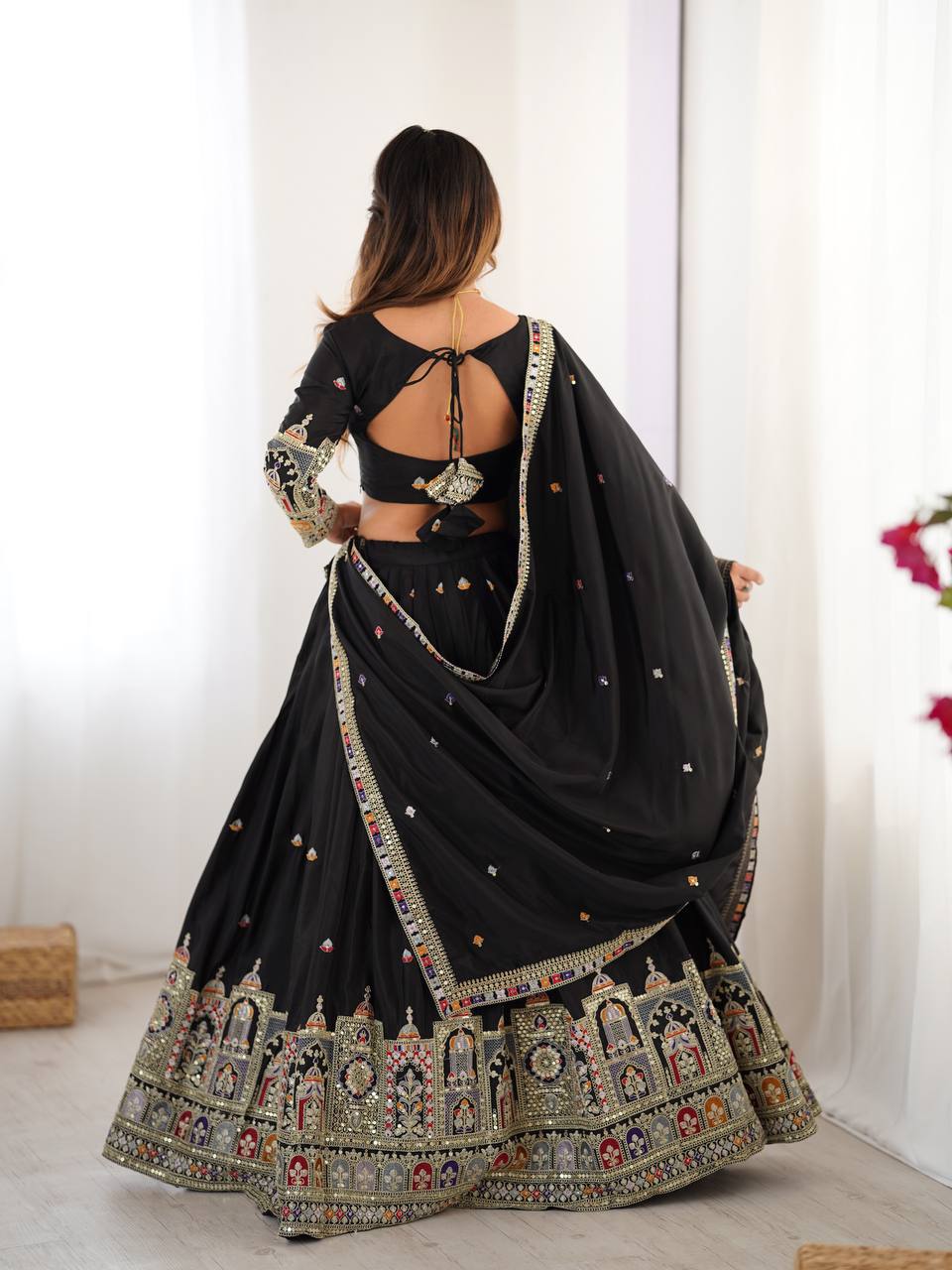 Kavyani Black Natural Crepe Silk Lehenga Choli Set – semi-stitched lehenga with 3-meter flare, canvas patta, cancan, and heavy embroidery in coding dori, thread, and sequins; paired with embroidered dupatta and unstitched matching choli – perfect for weddings, receptions, Diwali, and festive occasions.