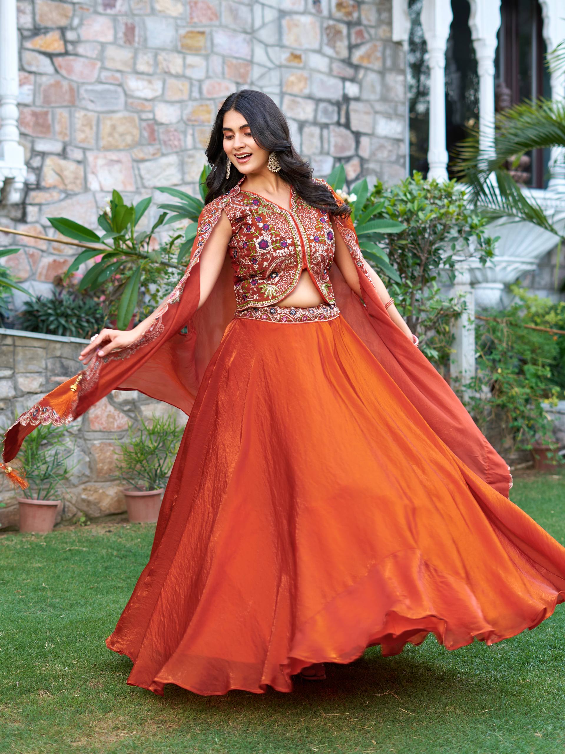 Orange festive wear Fendy silk lehenga choli with embroidery