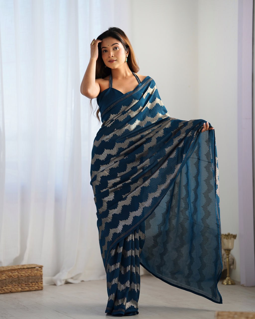 Elegant Aira Blue Georgette saree featuring heavy sequin embroidery and Seroski diamond work, paired with an unstitched satin Banglori blouse – perfect as a wedding saree, party wear saree, festive wear outfit, designer ethnic saree, and a must-have for lovers of premium georgette sarees.