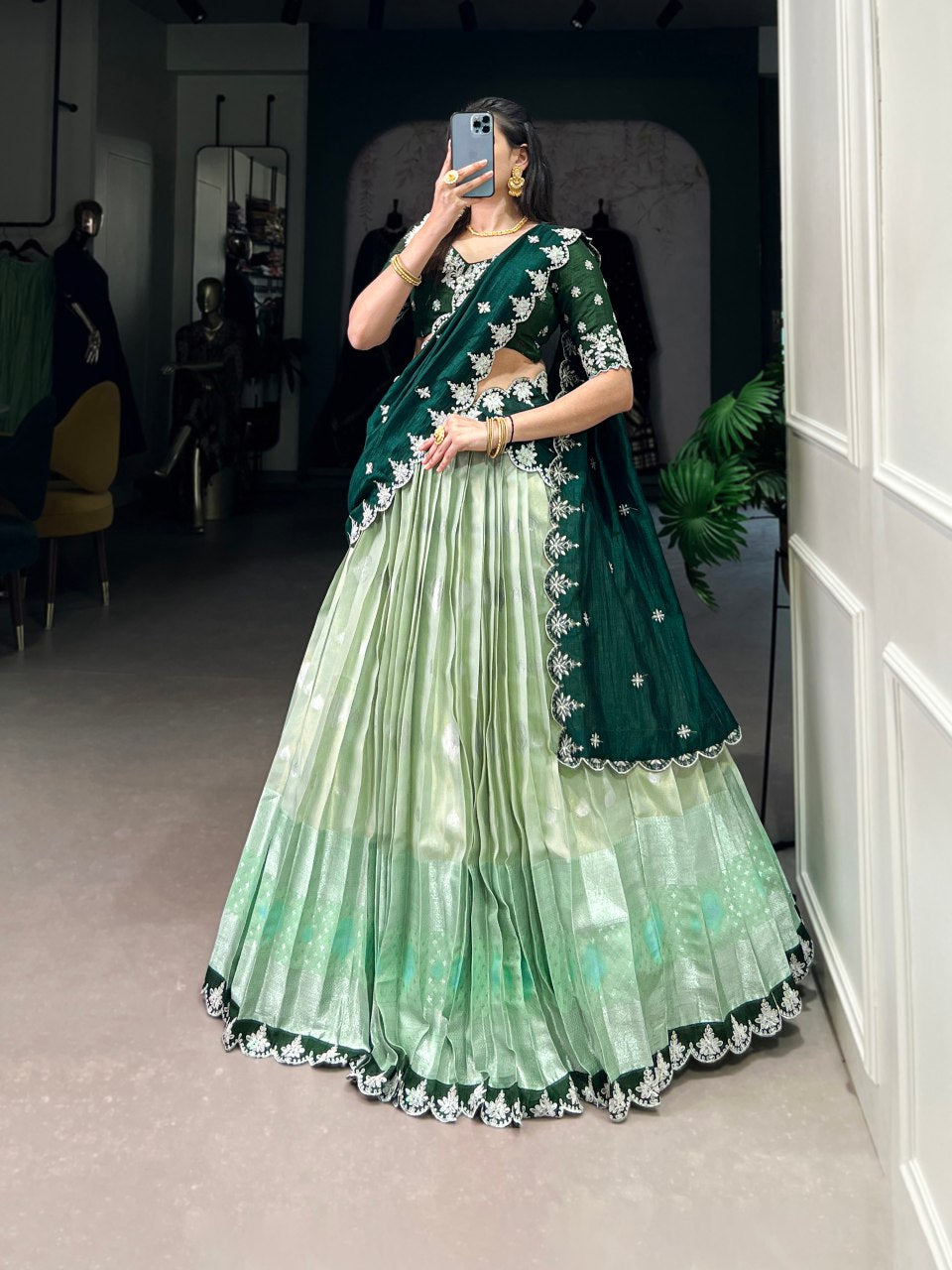 Pista green Zari Kota lehenga with intricate zari weaving work, paired with an embroidered Vichitra silk dupatta – a graceful outfit for festive and wedding occasions