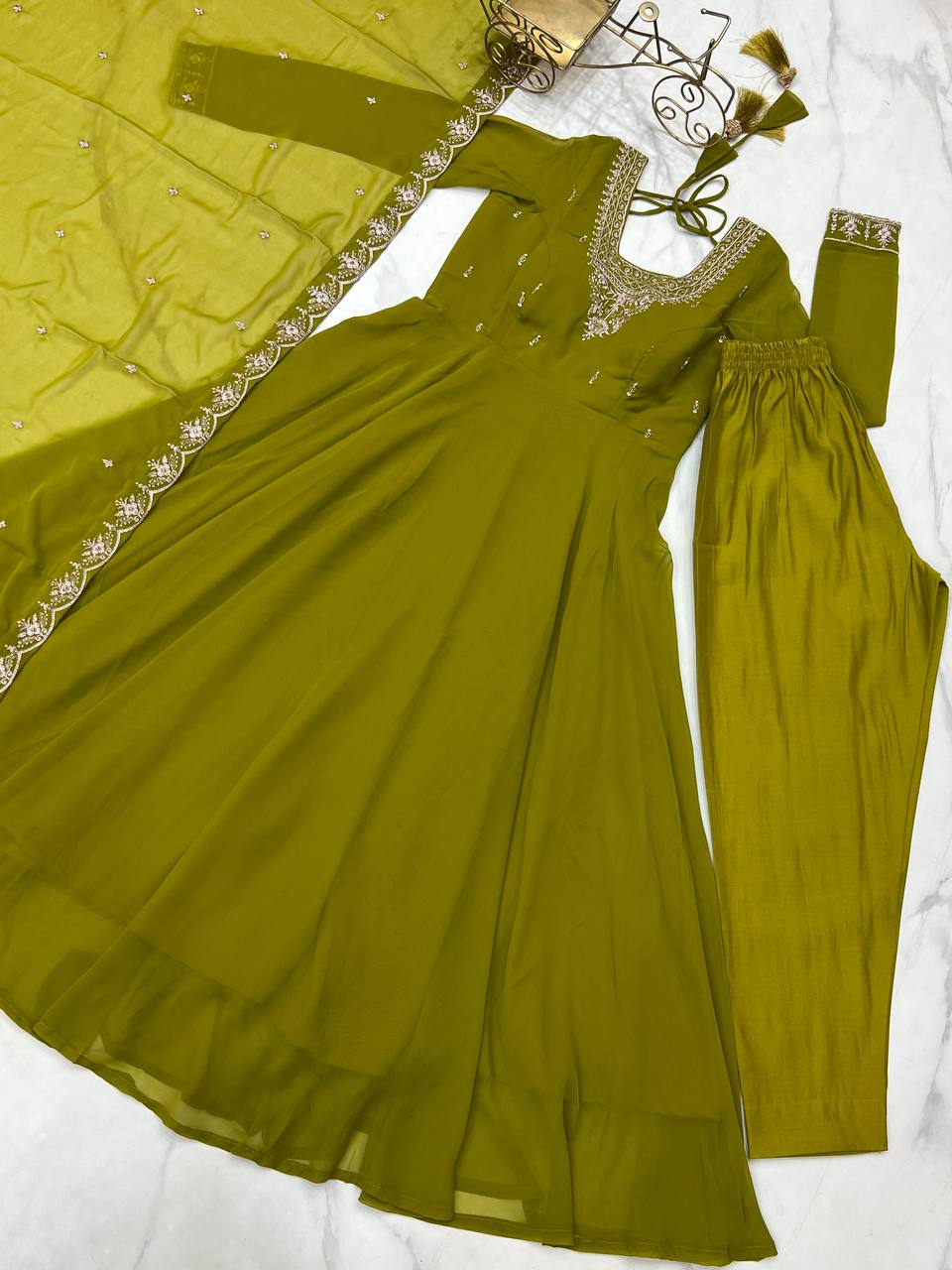 Green Anarkali suit in soft Fox Georgette with 6.5-meter flair, beads & zari embroidery, lace sleeves & dupatta – fully stitched & party-ready.