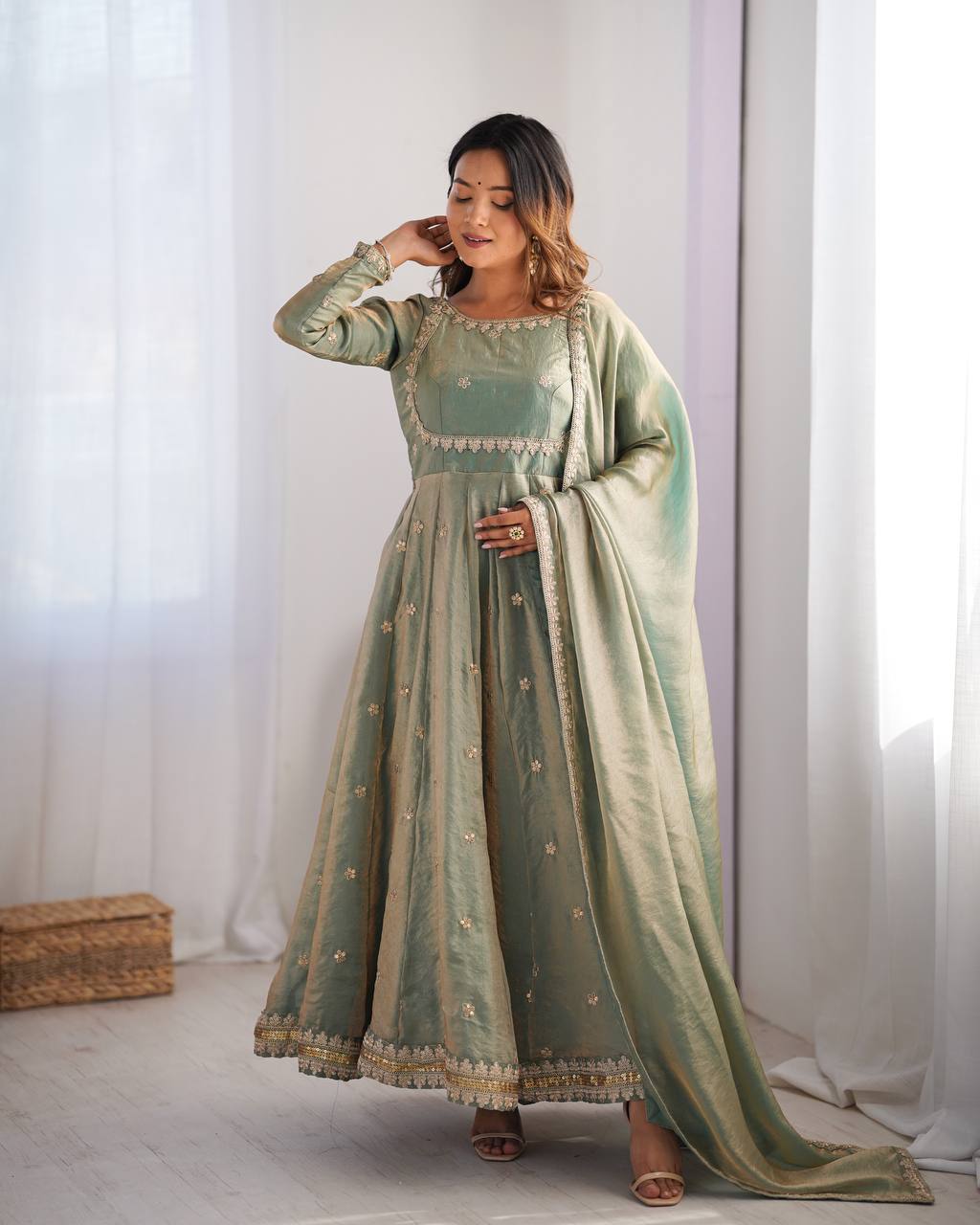 Neelika Sage Green Anarkali Suit Set – designer anarkali suit for women, green ethnic suit set, sequin embroidered gown dress, plus size Indian wear, traditional Indian outfits, wedding guest suit set, long anarkali gown with dupatta, stitched anarkali for party wear, green gown for haldi mehendi, readymade Indian suits for women.