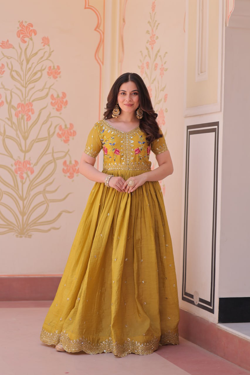 Mustard Yellow Gold Crush gown with zari, sequins, and multi-thread embroidery, featuring V-neck and short sleeves – perfect for weddings and festive occasions
