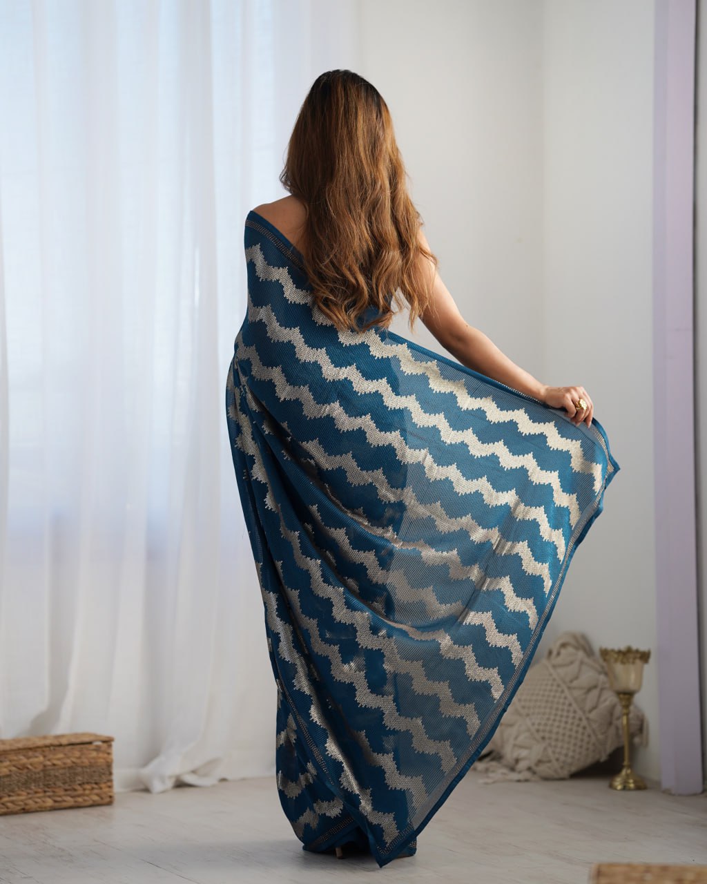 Elegant Aira Blue Georgette saree featuring heavy sequin embroidery and Seroski diamond work, paired with an unstitched satin Banglori blouse – perfect as a wedding saree, party wear saree, festive wear outfit, designer ethnic saree, and a must-have for lovers of premium georgette sarees.