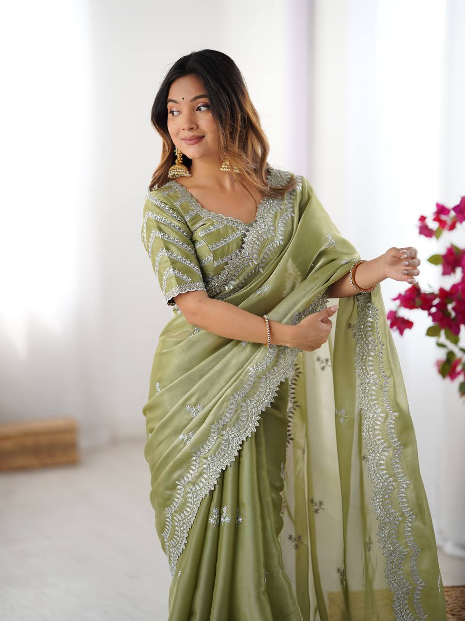 Vikatya pista green Jimmy Choo fabric saree with sequin-thread embroidery & unstitched blouse—perfect for weddings, festivals & party wear.