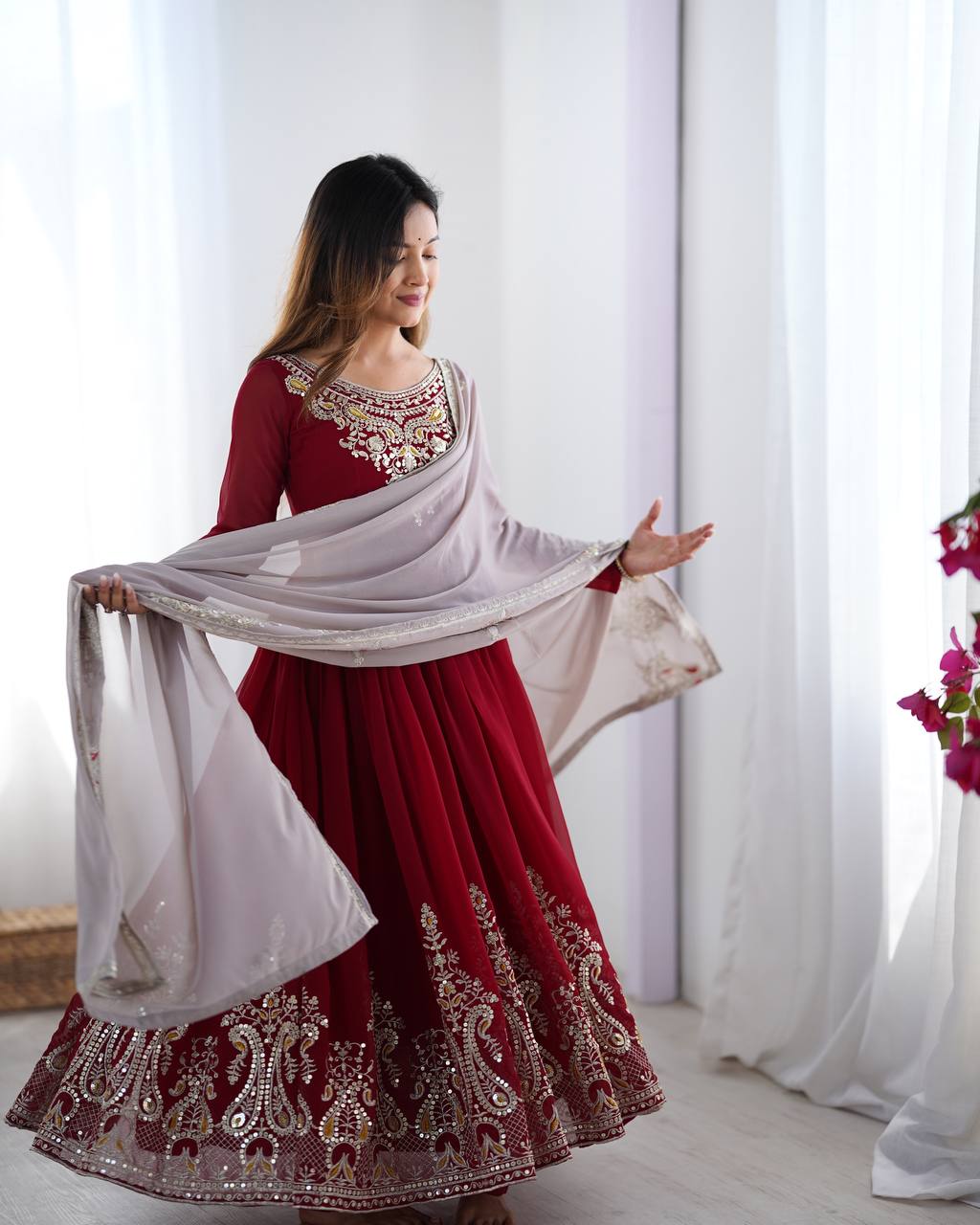Tejvini Maroon Embroidered Gown Set – heavy georgette gown with multi-thread 5mm sequin embroidery, full sleeves, soft micro cotton lining, paired with matching maroon embroidered dupatta and stitched cotton bottom – ideal for weddings, festive events, and reception looks.