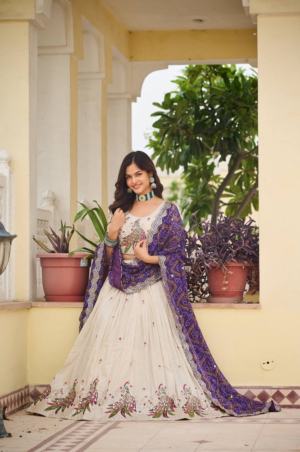 Amla Off-White Tissue Silk Sequins Thread Work Lehenga Choli with Purple Bandhej Dupatta