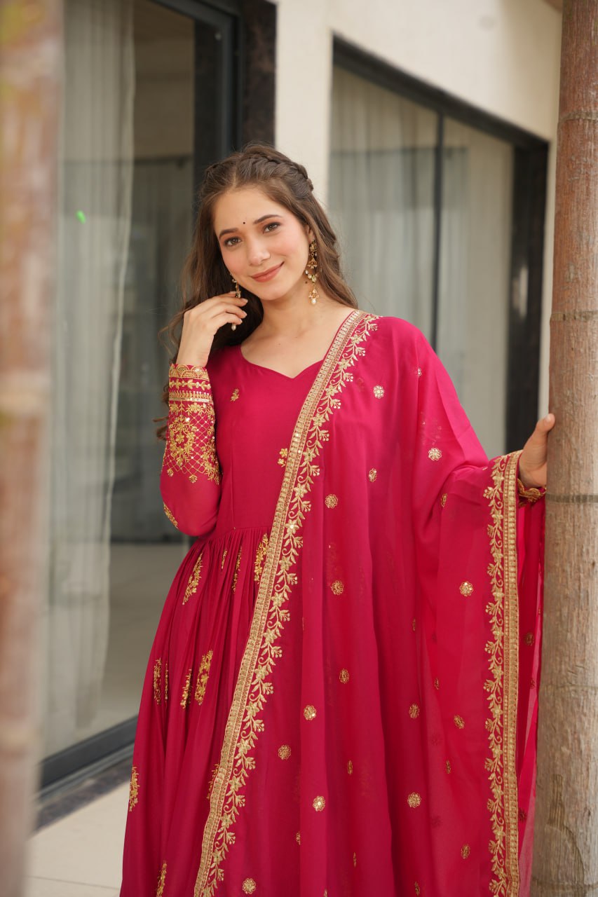 Rudrika Pink Embroidered Gown in soft Star Georgette with intricate zari and sequin work, full-length 56-inch flare gown with matching embroidered dupatta, elegant pan neck design, perfect for weddings and festive occasions